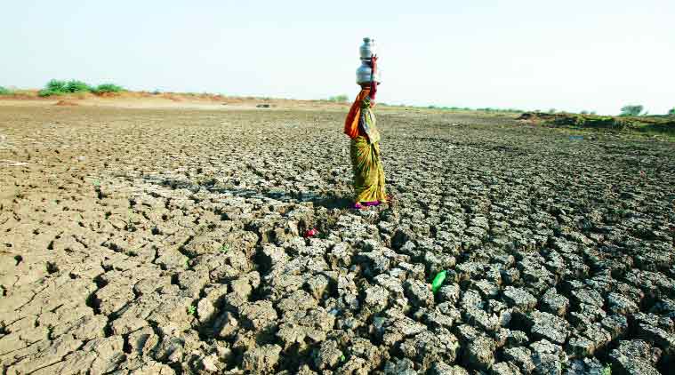 woman carrying water