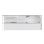 Transparante doos met een set witte plastic bestek kleur wit derde weergave