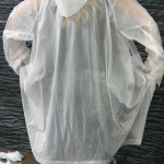 Regenjas in één maat met voorsluiting en inbegrepen capuchon kleur doorschijnend