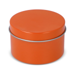 Plantaardige wax kaars in monochrome ronde pot van gerecycled staal kleur oranje