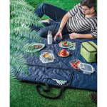 Opvouwbare picknickdeken van polyester die verandert in een tas luxe weergave