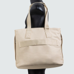 Tas van kunstleer met verborgen vakken en trolleyband 15,6” kleur beige