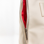 Tas van kunstleer met verborgen vakken en trolleyband 15,6”