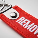Geborduurd polyester label met dubbele ring, customizebaar kleur rood vijfde weergave