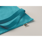 Fairtrade katoenen tas met lange hengsels in diverse kleuren 180g/m2 kleur turquoise foto bekijken vijfde weergave