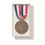 IJzeren medaille met driekleurig lint van blauw, wit en rood kleur bruin