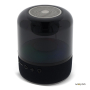 Kleine draagbare zwarte bluetooth-speaker in cirkelvorm