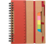 Notitieboek van gerecycled gelijnd papier met plaknotities en pen kleur rood