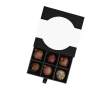 Borstje pralines chocolaatjes in de vorm van een kerstbal kleur zwart