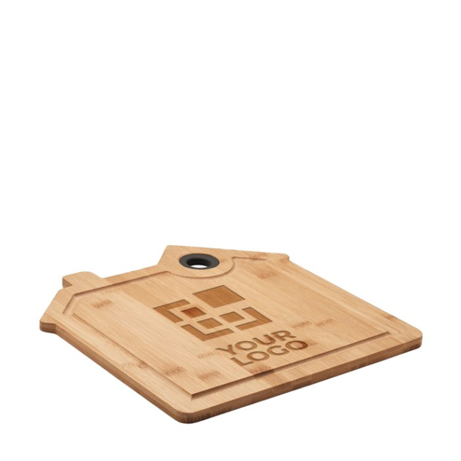 Houten snijplank in de vorm van een huis