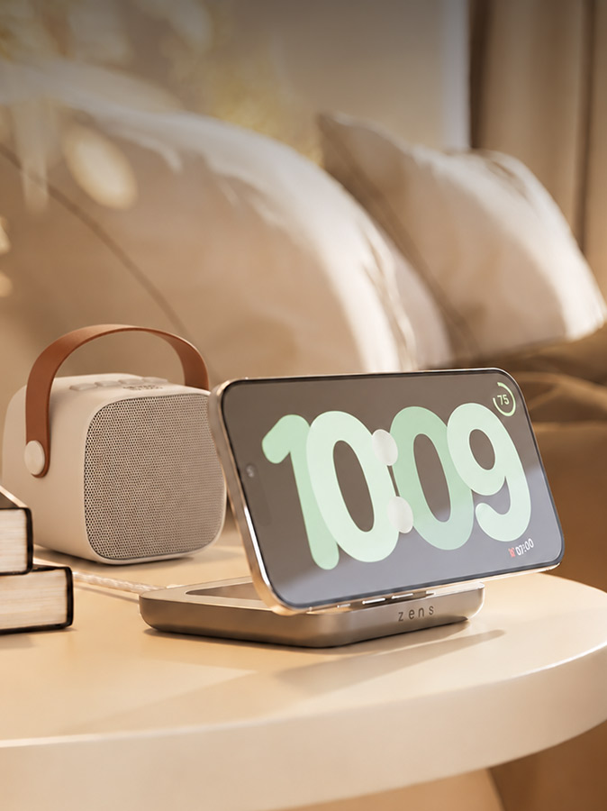 Draadloze oplaadstandaard voor telefoons naast het bed